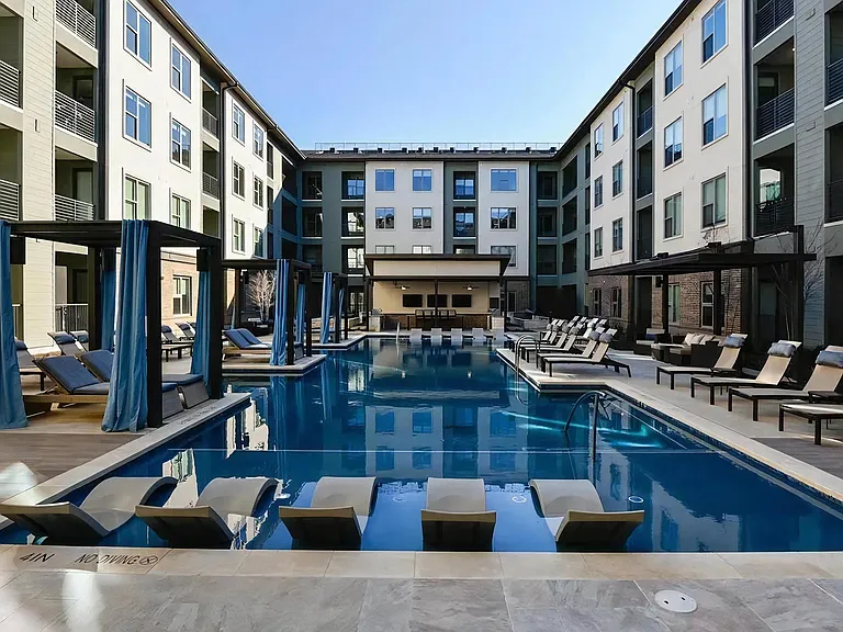 The Elm at River Park Pool with Shaded Cabanas and Lounge Deck