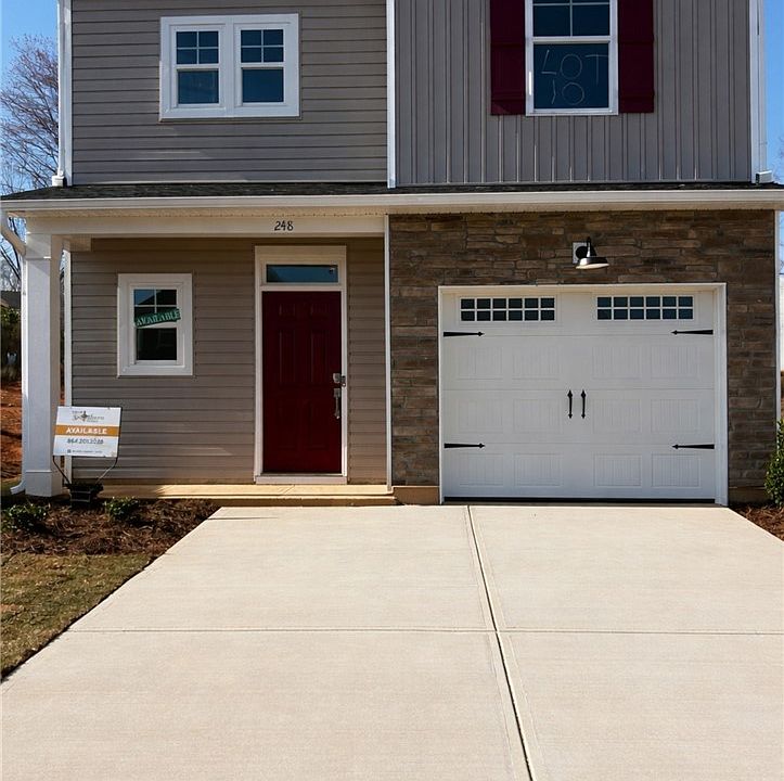 This newly constructed home features a welcoming e