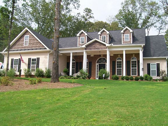 Enjoy the outdoors under large Front Porch