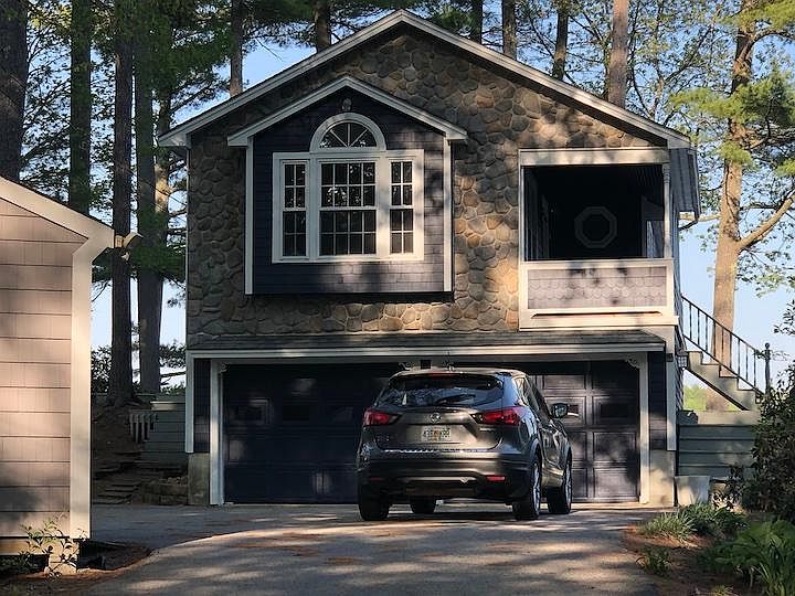 Front of the house. Attached 2 car garage.
