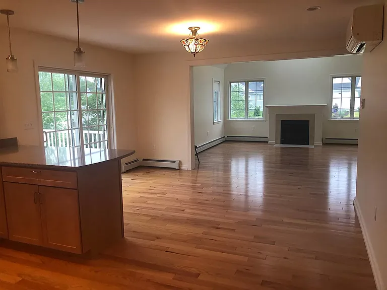 Eating area, deck and living room from kitchen