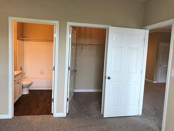 In-suite master bedroom with walk-in closet and shower/tub 