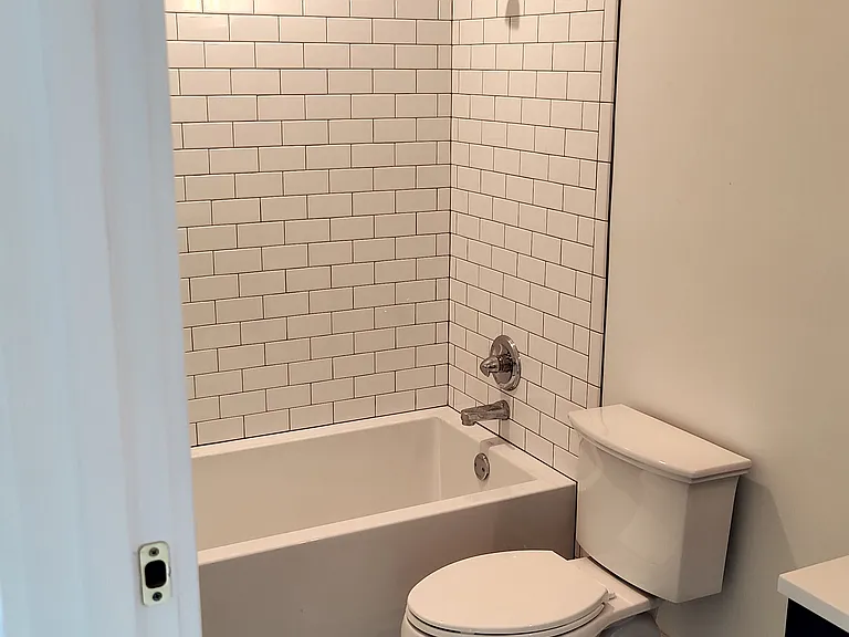 View from bathroom door of SE bedroom. Bathroom is private to this room only.