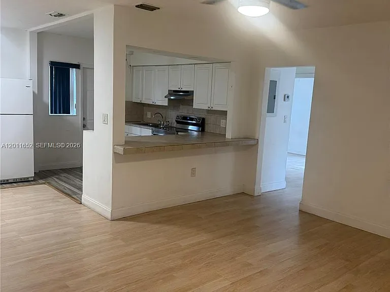 411 NW 106th St — Photo 13
