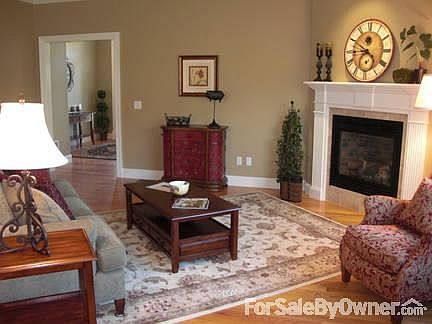 Living Room
						:
						All our living areas have custom moldings around doors, windows & crown.