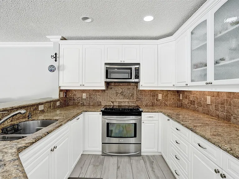 4142 NW 58th Dr — Photo 22