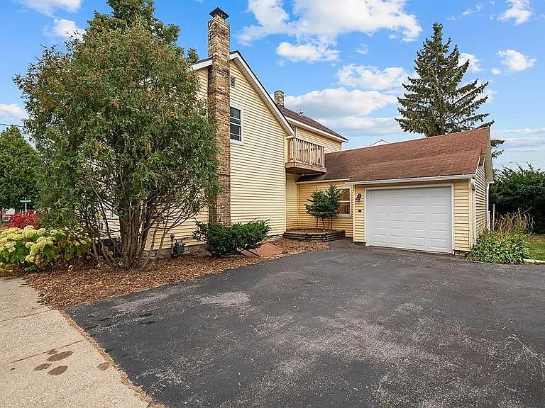Extieror - Balcony and Attached Garage