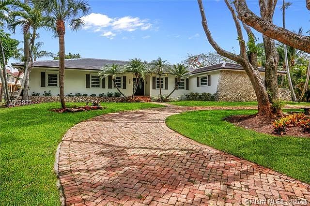 Circular and side Chicago brick driveways; house is nicely set back and has a higher elevation than most in the community.  Pine