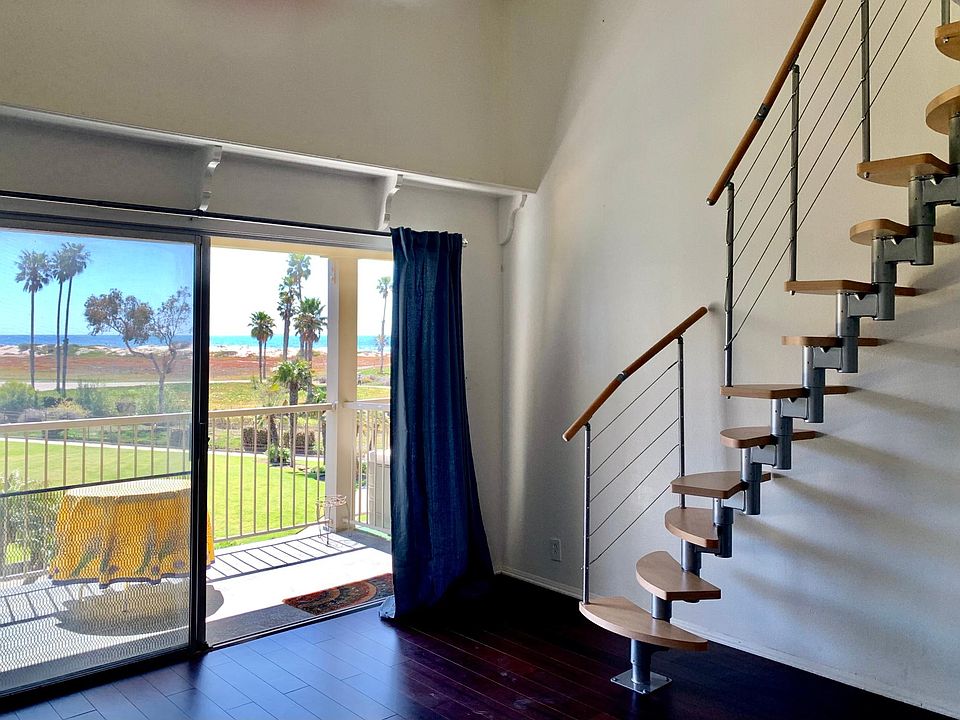 Living room ,deck/patio, stairs to loft