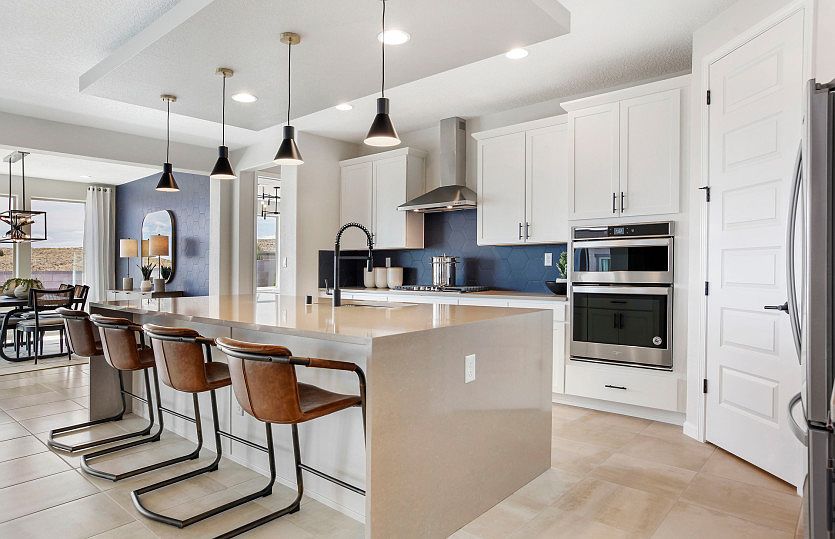 Enter the Parklane kitchen complete with a large waterfall island, ample storage space, and designer