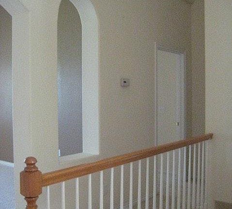Hallway looking into upstairs family room