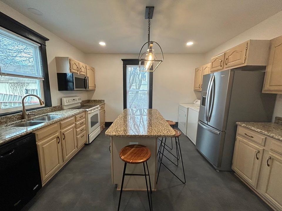 Newly renovated eat-in kitchen with laundry