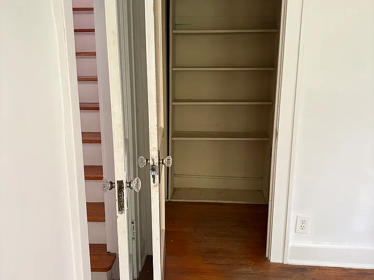 Second bedroom looking into closet.