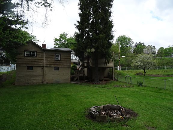 View of full basement and deck at garage