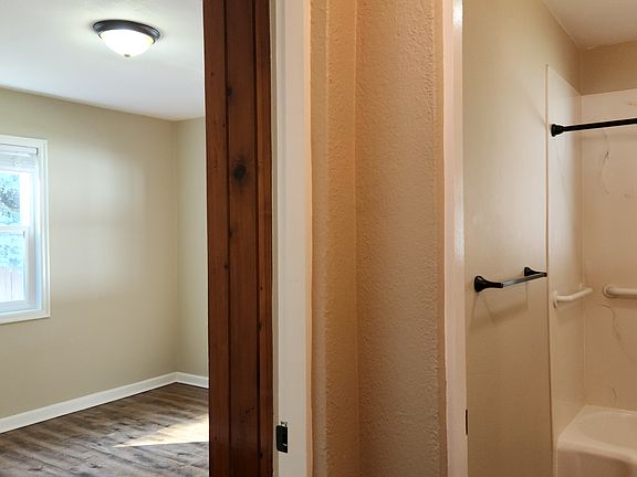 Hall entry to bedrooms and bath.