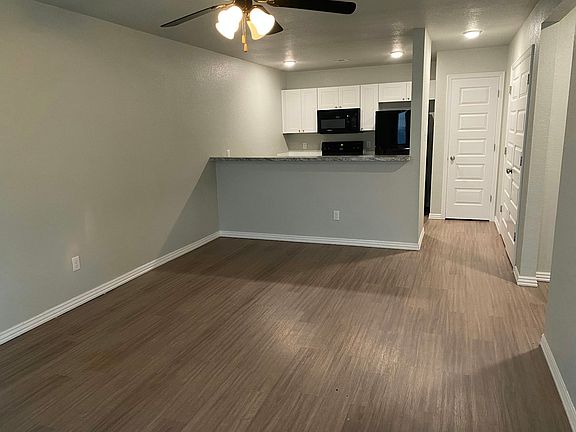 View from front door into duplex. Pantry and washer/dryer on the right
