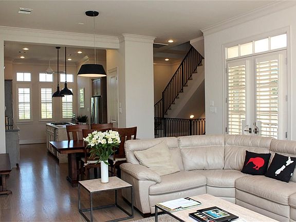 Open floor plan looking from living toward dining and kitchen.