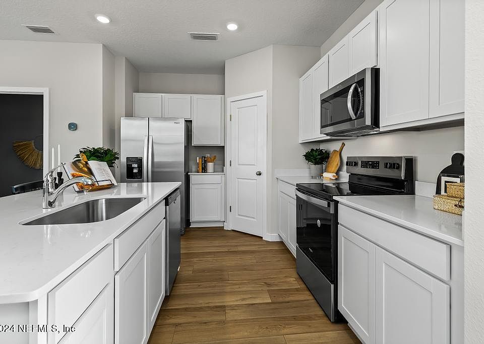 1st image of 14507 MACADAMIA Lane #313