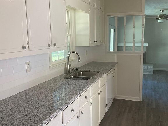 Kitchen with new countertop and backsplash