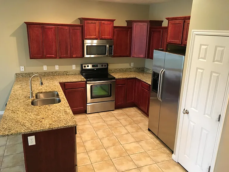 Kitchen. Stainless steel appliances and nice size pantry.
