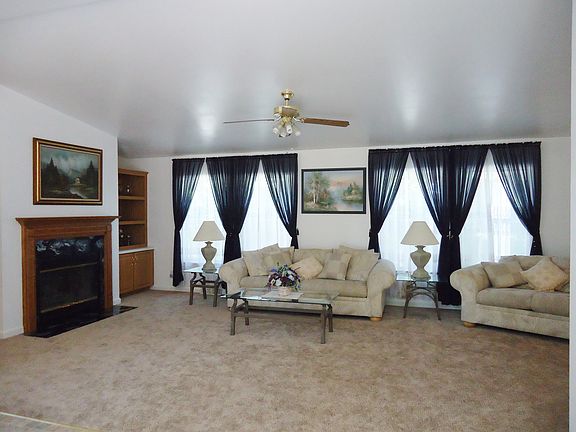 Living Rm w/ wood burning fp