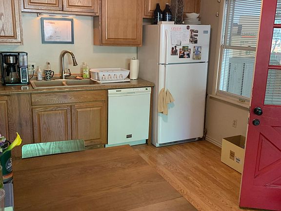 View of kitchen and front door
