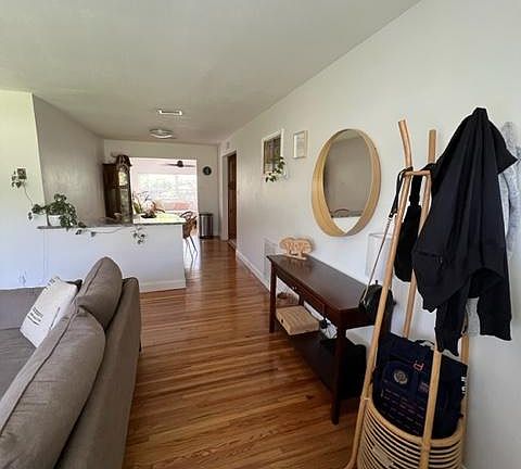 Entryway with open floorplan with views into the backyard.