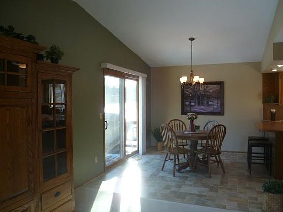 Your dining area leads out to your deck.