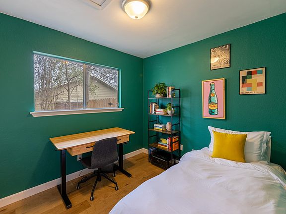 The third bedroom and office features a closet, as well as room for a desk and a twin bed or couch for all your remote work needs.