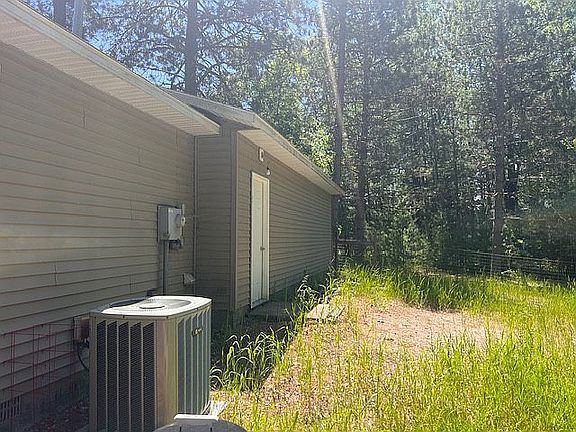 Back yard - Garage/AC Unit