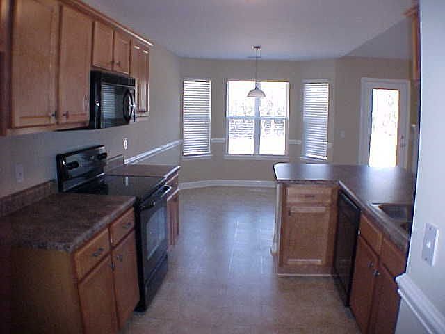 All Black Appliances & Breakfast Nook