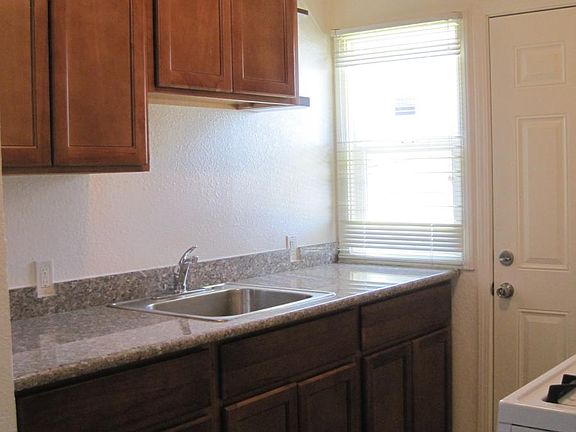 State of the art solid wood kitchen with granite counter top