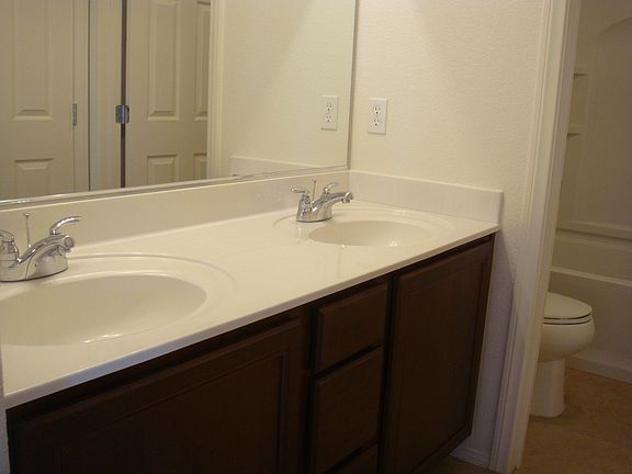 Secondary Bath Has Dual Sinks