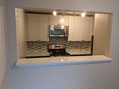 Kitchen Opens to Dining Room