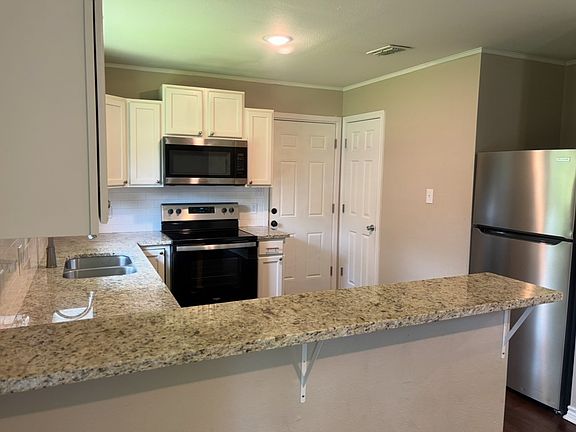 Kitchen with double pantry storage