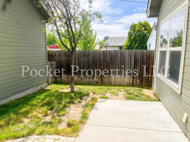 Backyard patio connecting to garage