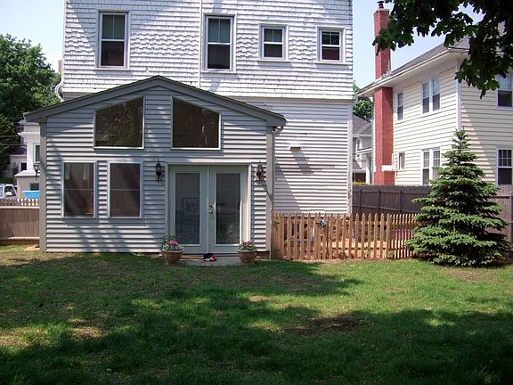 Newly finished mudroom w/ fenced dog area