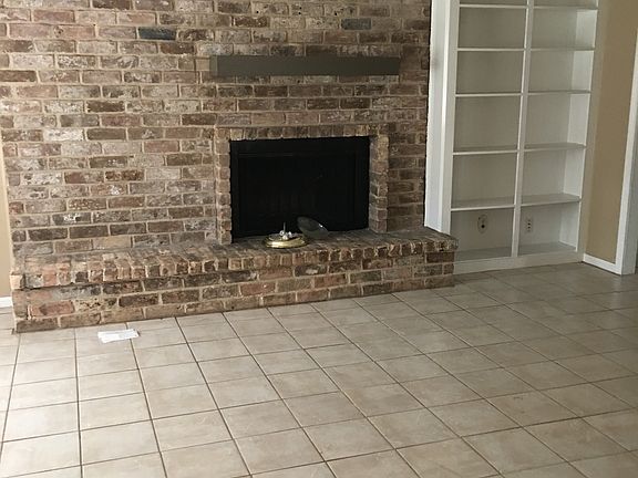 Family room with wood burning fireplace