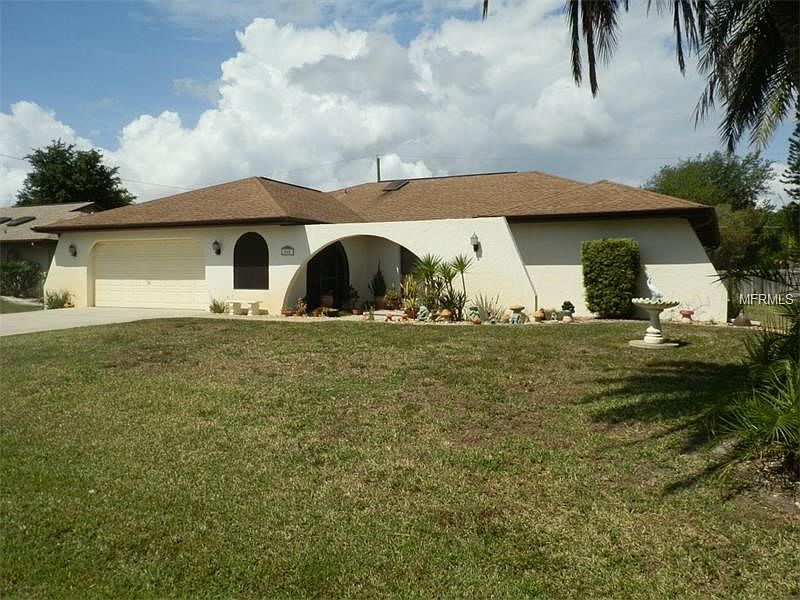 Front view of Spanish Style ranch home