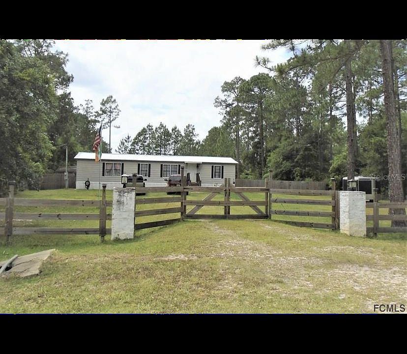 This is the view of house from road. Culverts are clean, and maintained by county