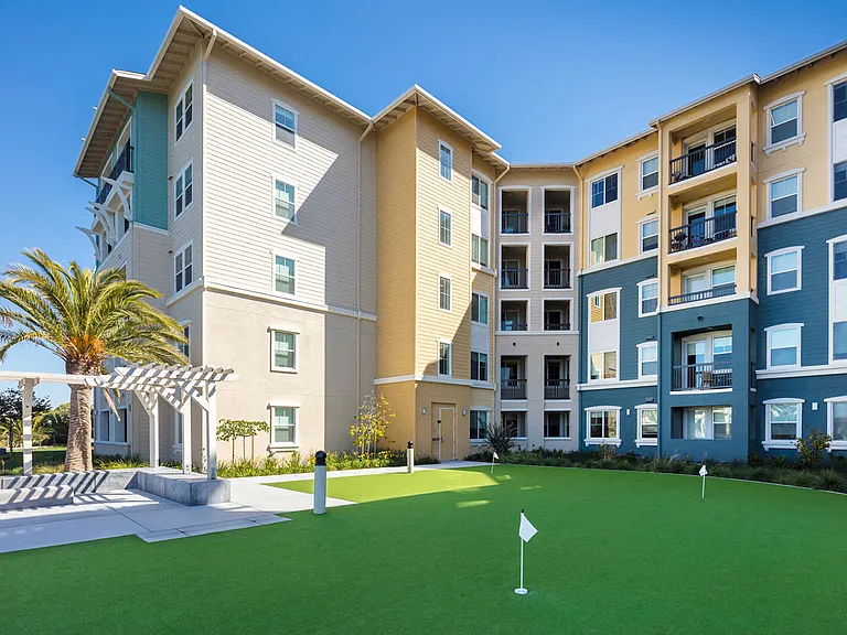 Putting green with waterfront view