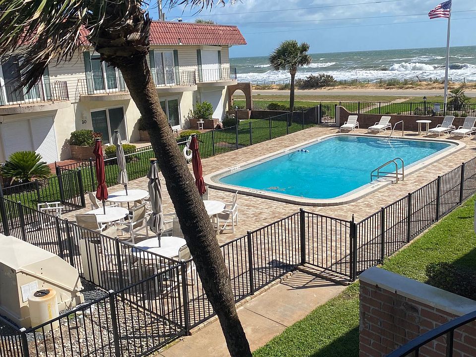 view of pool from second floor balcony