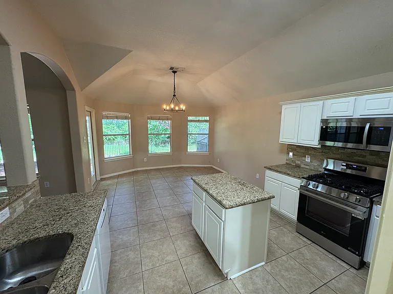 Kitchen overlooking breakfast area