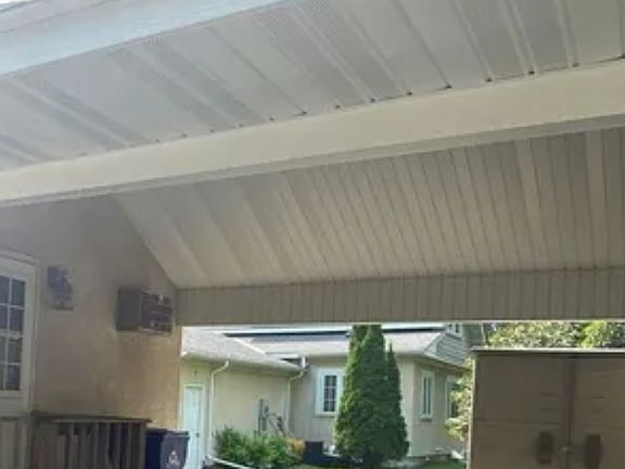 Attached Carport and Storage Shed