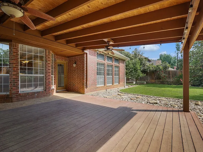 Spacious covered patio with fans