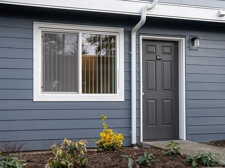 Welcome home to elegance and style with this modern exterior entrance.