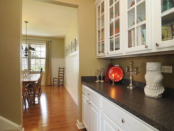 Separate butlers pantry with glass front 42in cabinetry