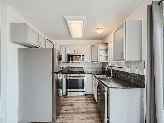 Remodeled kitchen with stainless steel appliances