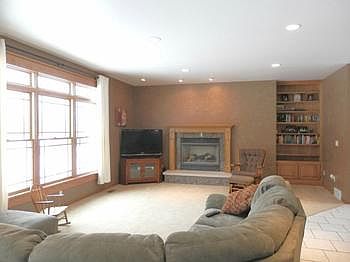 Very open large living room with gas fireplace