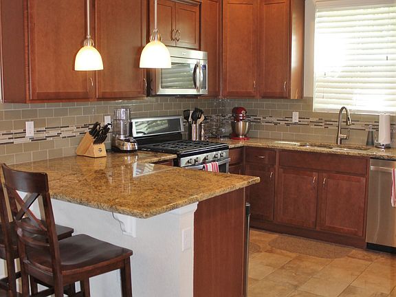 Kitchen with bar/island